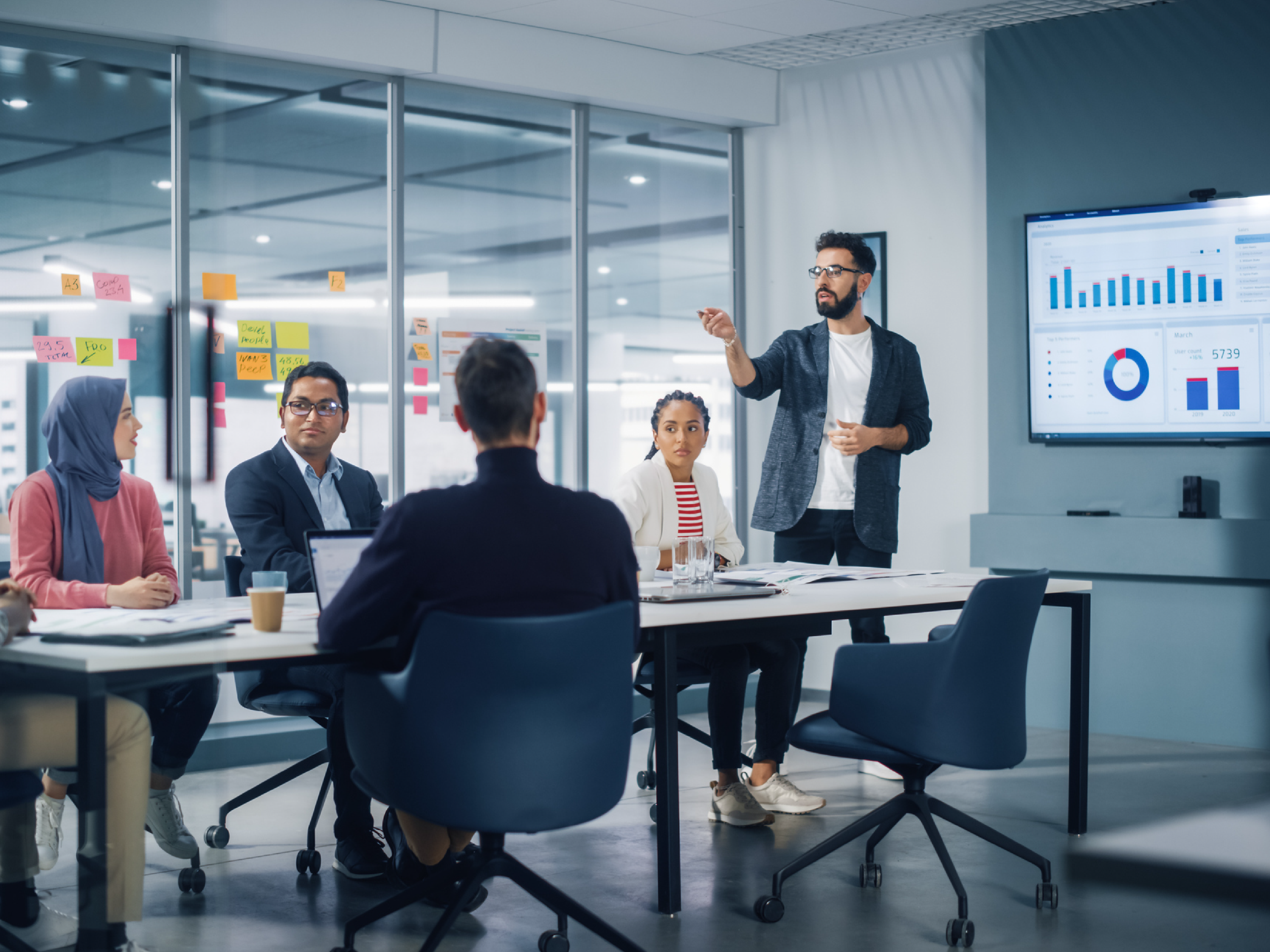 Group of employees in meeting room