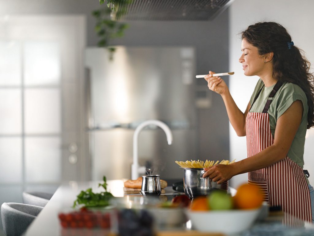 Lady cooking in the kitchen