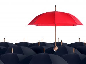 Employee Holding a Red Umbrella